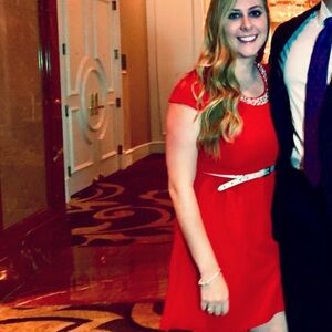 Red dress with decorative neckline